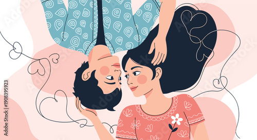 Romantic couple lies on a pink background looking at each other while connected by a delicate string shaped like several hearts.