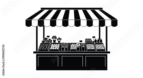 A black and white illustration depicts a market stall with a striped awning and various goods displayed