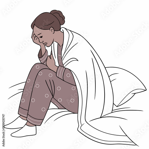 Woman sitting on bed feeling unwell wrapped in blanket
