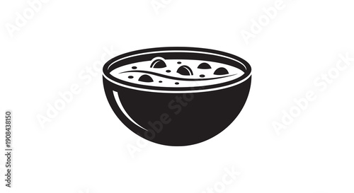 A simple black and white illustration depicts a bowl filled with a textured substance and several rounded objects