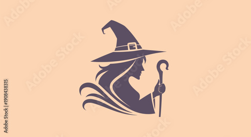 Silhouette of a witch with hat and staff
