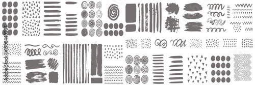 Collection of hand-drawn grunge brush strokes, dots, lines, and abstract shapes for creative design elements
