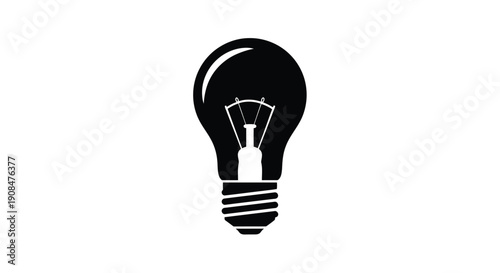 A stark black silhouette of a traditional incandescent light bulb