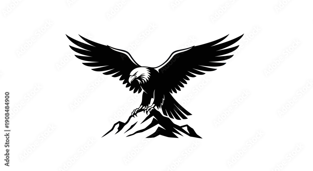 Fototapeta premium Soaring eagle silhouette over mountain peak