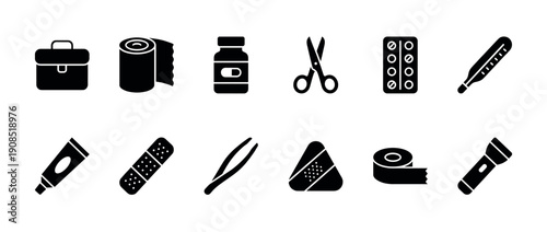 Collection of black solid glyph icons depicting first aid kit supplies like bandages, pills, scissors, and a thermometer for medical emergencies and healthcare