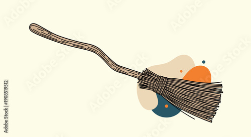 Traditional wooden broomstick with a crooked handle and bundle of twigs over colorful abstract background shapes.