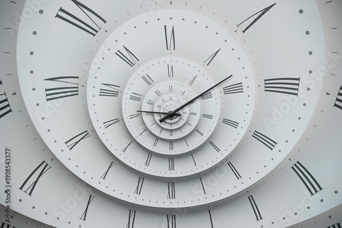 Foto Vintage white spiral clock dial with roman numerals