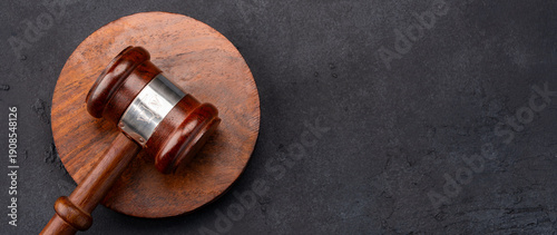Fotografie Judge's gavel on the black stone table