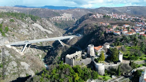 Combining history and modernity: Trsat Castle overlooks the Rjecina Valley, with the impressive Rjecina Viaduct spanning the gorge. A stunning aerial view of Rijeka, Croatia.