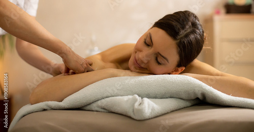 Woman receiving a massage a...