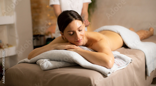 Woman receives massage in s...