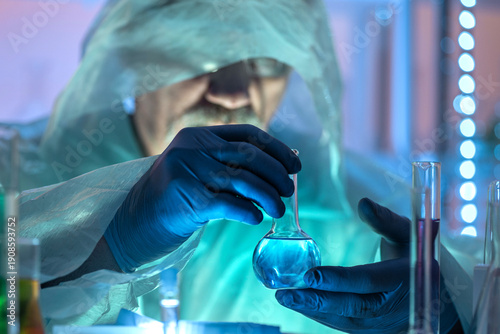 Картината върху платно Illegal lab, laboratory, scientific scene with hooded chemist handling samples among glassware, suggesting clandestine chemical analysis and covert research
