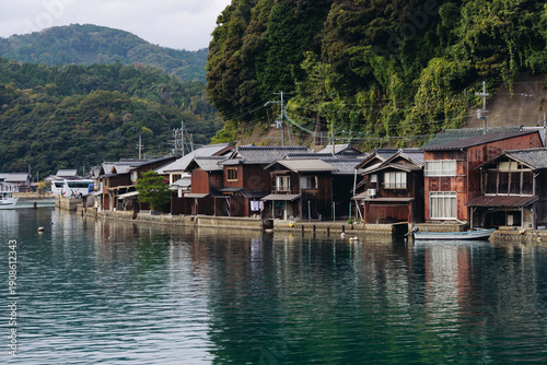 Ine Fishing Village, Kyoto prefecture, Japan, Ine-ura landscape coastal view, Funaya, traditional wooden boat houses, Ine Bay during boat tour cruise, Yoza District, in a autumn fall day