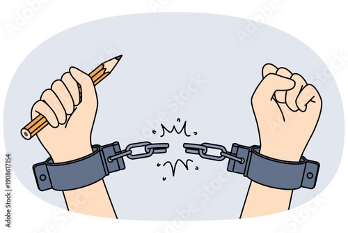 Hands of handcuffed reporter at moment of liberation, holding pencil to write honest investigative journalism. Liberation of man from shackles, as metaphor for emergence of free mass media