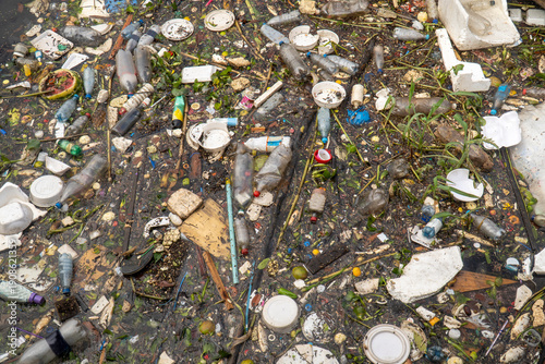 Plastic waste polluting a river in the Amazon river, Manaus, Brazil. Environment, ecology, conservation, global warming, climate change, water.