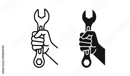 Two hands holding wrenches in black and white