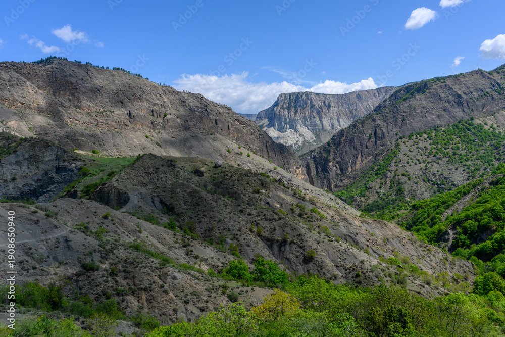 Naklejka premium Mountainous Landscape Under Blue Sky. Dagestan Russia.