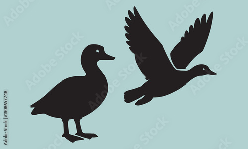 Duck silhouettes featuring standing waterfowl and bird in flight for hunting logos or lake habitat conservation designs on pale blue background