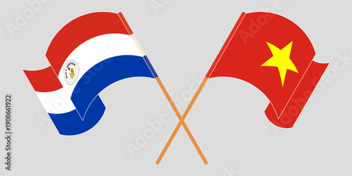 Crossed and waving flags of Republic of Paraguay and Vietnam. Vector illustration