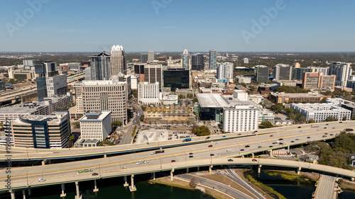 A wide drone shot showcases Orlando’s urban core and the 408 expressway connecting the city’s business districts.
