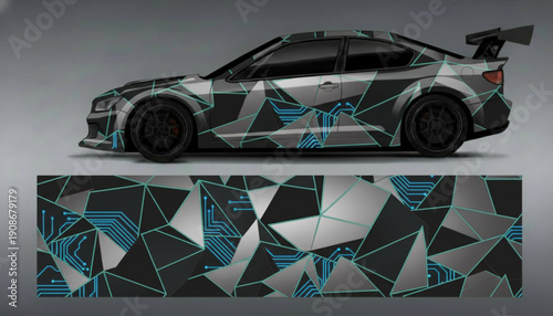 Side view of a car with a futuristic geometric circuit board wrap design, showcasing a grey, black, and blue triangular pattern.