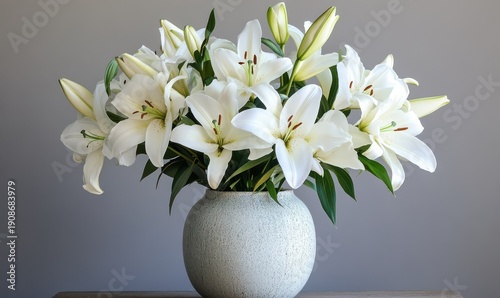 Elegant bouquet of white lilies arranged in a sleek ceramic vase, soft natural light creating a timeless and refined floral arrangement