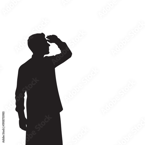 A man in silhouette looking into the distance