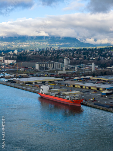 Wallpaper Mural Red Cargo Ship At Busy Burnaby Port With Industrial Docks And Mountain Backdrop Torontodigital.ca
