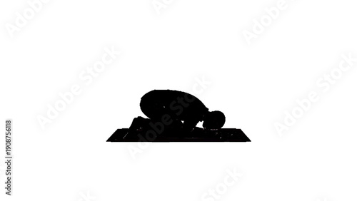 Muslim Man Prostrating in Sujud Prayer on Mat