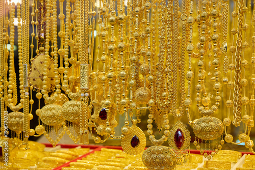 Canvas Print Intricate gold jewelry display with ornate designs and gemstones