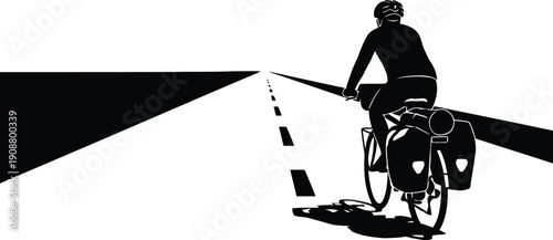 Cycling Adventure on Open Road: Silhouette of Bicyclist Against Clear Horizon