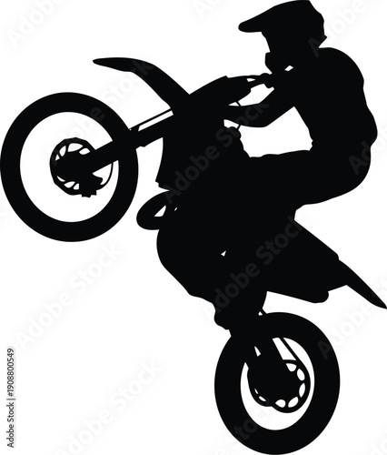 Dynamic Silhouette of a Motorcycle Rider Performing a Wheelie on Dirt Bike