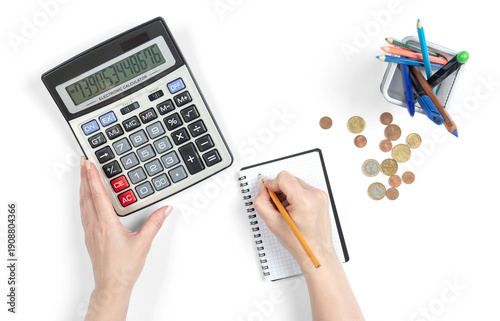 Konstfotografi Female hands calculating personal finances with calculator, euro coins and pencil