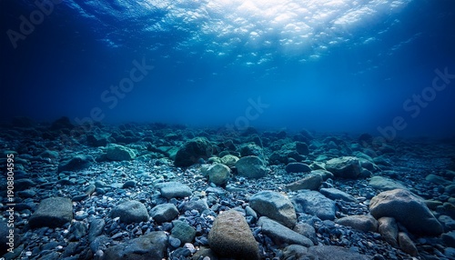 Dark Blue Ocean Seen From Underwater Dead Seabed Of Stones And Rocks