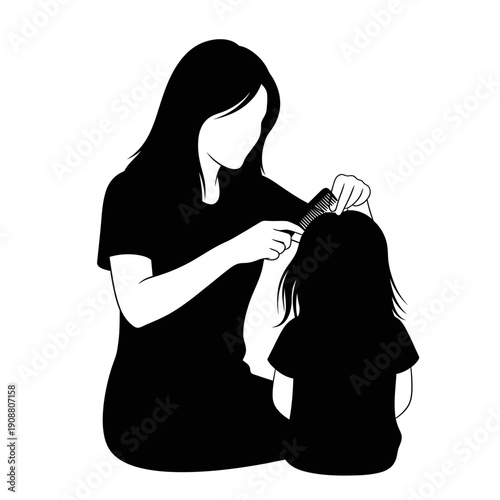 A mother lovingly combs the hair of her young child in a silhouette