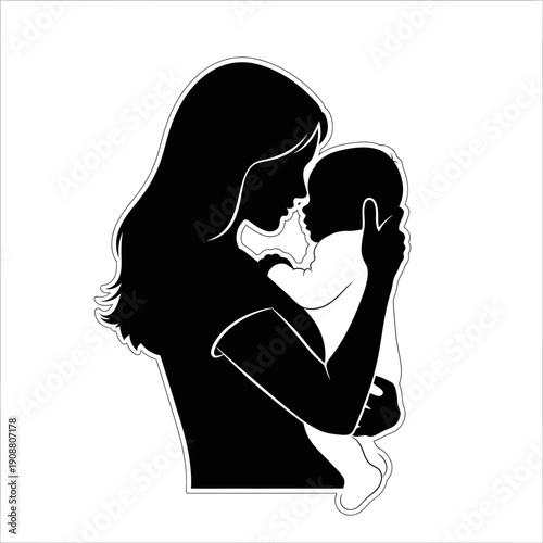 Silhouette of a mother gently cradling and holding her baby
