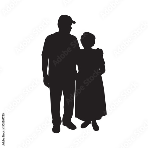 Silhouette of an elderly couple standing closely together