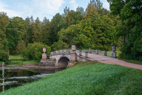 Slavyanka River Valley and the Viscontiev Bridge in the Pavlovsk Palace and Park Complex on a sunny summer day, Pavlovsk, Saint Petersburg, Russia
