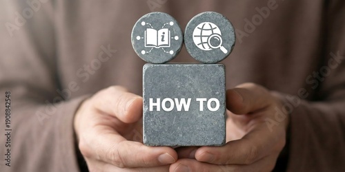 Man holding white blocks with icons sees inscription: HOW TO. How to guidebook business education technology concept. How-to book guide knowledge. new