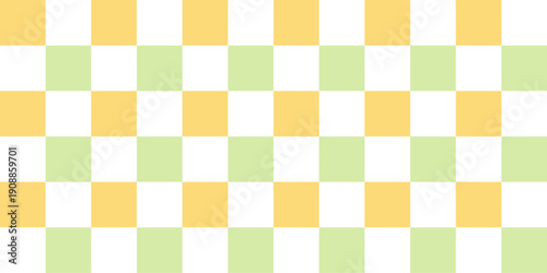Childish checkered pattern on yellow and green. Fresh spring background. Cute baby seamless print. Pastel color