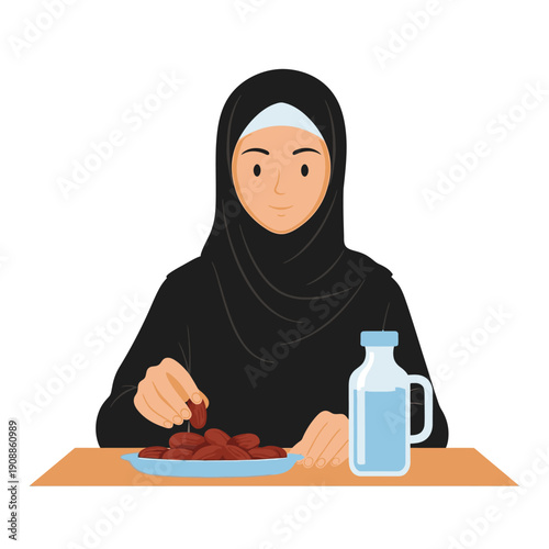 Muslim woman breaking fast with dates and water
