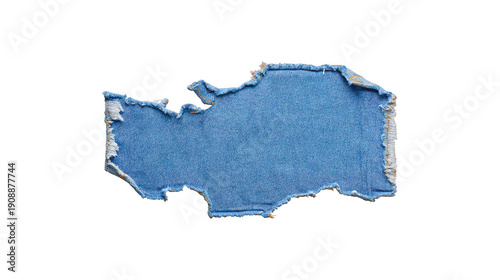 Blue denim scrap with torn edges and texture, isolated on black background for design use