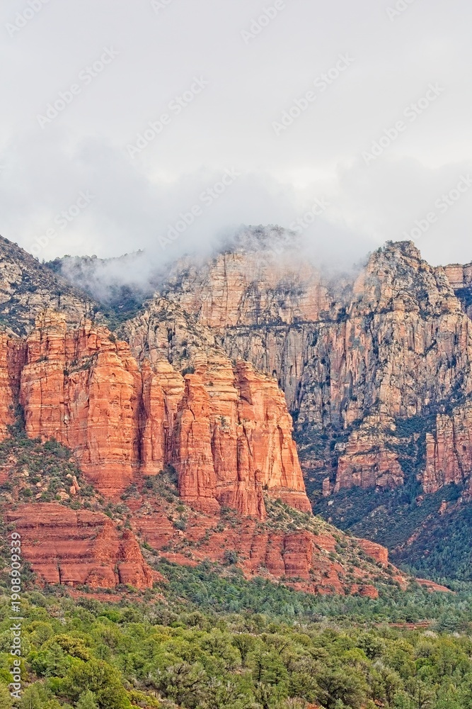 Naklejka premium The Red Rocks of Sedona, Arizona in a heavy fog.