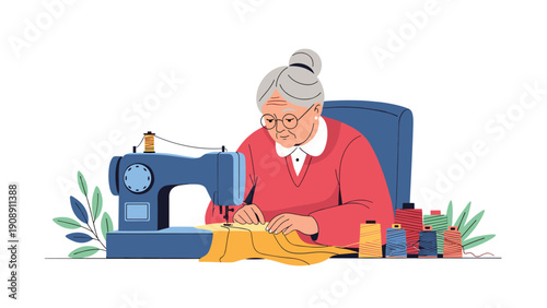 Senior woman with glasses meticulously sewing yellow fabric using a blue sewing machine at her workstation with various spools of thread.