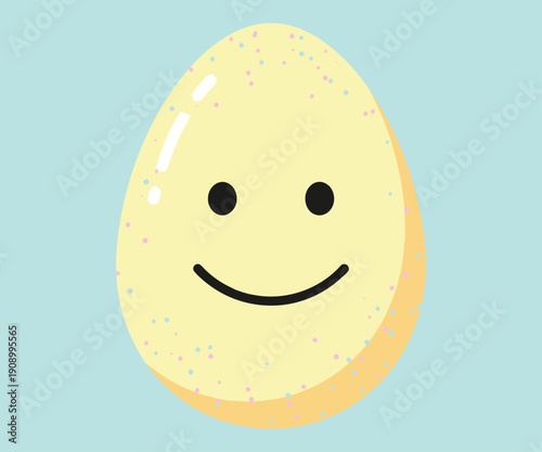 A cheerful yellow egg with a smiling face and speckled shell