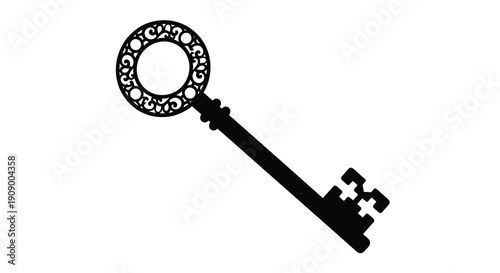 Intricate antique key design presented as a dark silhouette