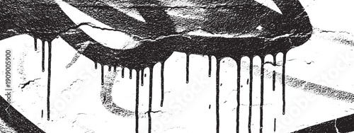 Black and white closeup of dripping paint on a textured surface.