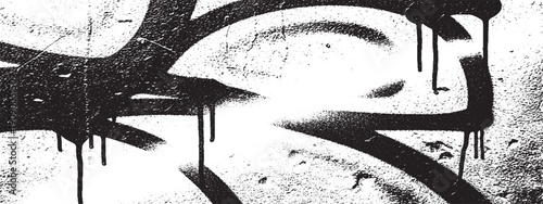 Black graffiti spray paint on a textured wall with drips.