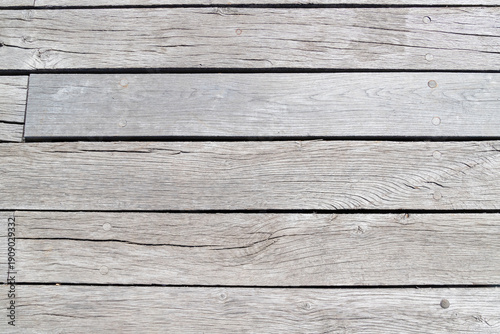 Aged Wooden Planks With Textured Finish In Natural Outdoor Setting