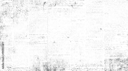 Faded vintage newspaper text with scattered grey ink spots and smudges